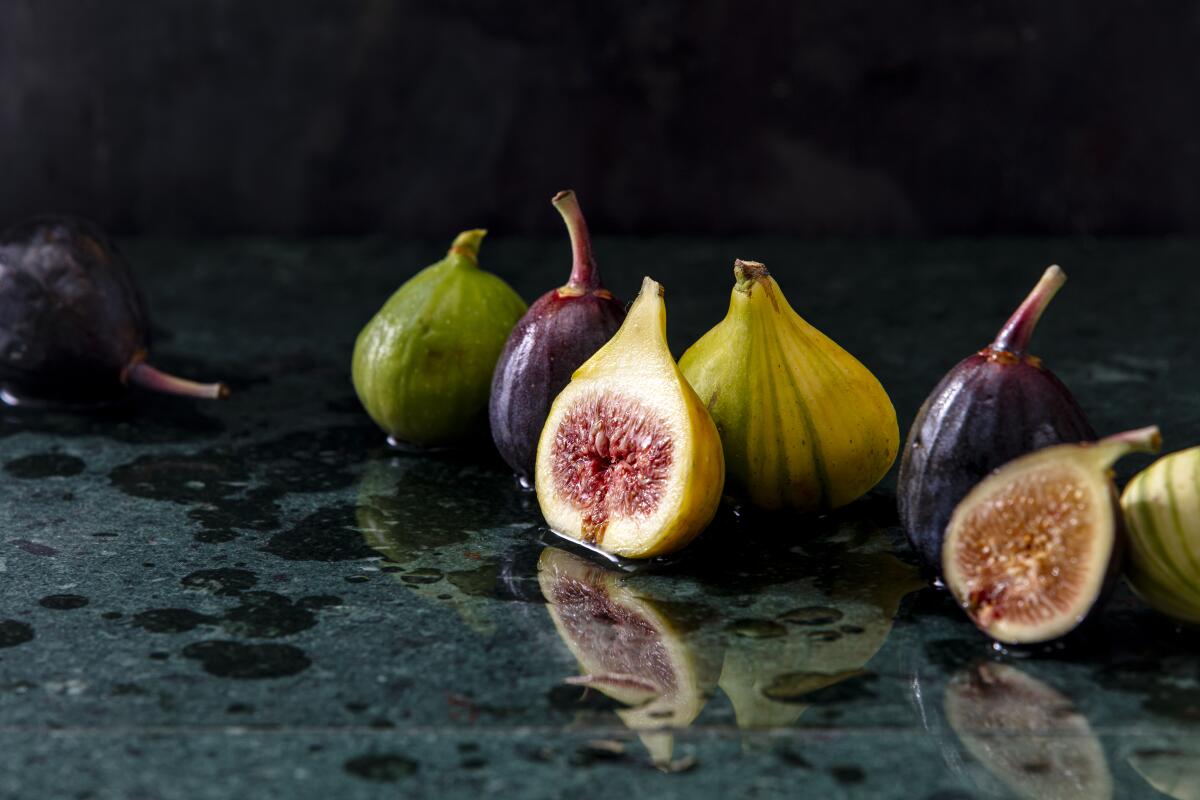 A variety of whole and cut figs