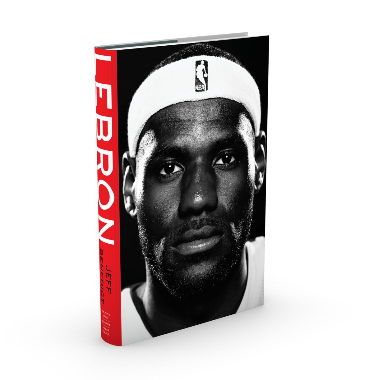 A photo of LeBron James' face is featured on the cover of the book "LeBron" by Jeff Benedict.