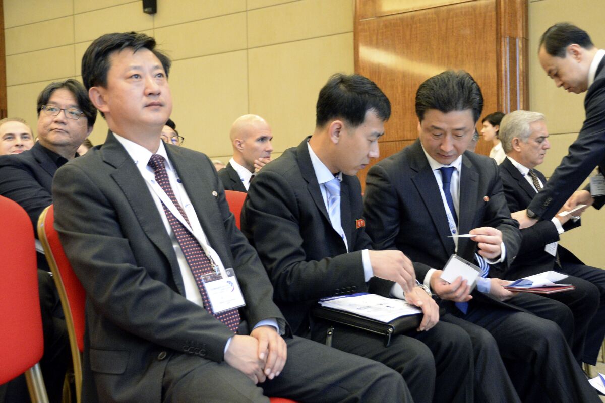 Jo Chol Su, left, director of the North Korean Foreign Ministry's North American Affairs Department, attends an international nuclear nonproliferation conference in Moscow on Nov. 8, 2019. North Korea has warned the U.N. Security Council against criticizing the isolated country's missile program, in a statement Sunday that included unspecified threats against the international body. On Sunday, Oct. 3, 2021, Jo Chol Su, a senior North Korean Foreign Ministry official, warned the U.N. council it “had better think what consequences it will bring in the future in case it tries to encroach upon the sovereignty” of North Korea. (Kyodo News via AP)