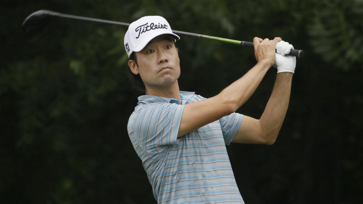 Kevin Na watch his shot from the sixth tee during the third round of the Colonial in Fort Worth, Texas, on May 23, 2015.