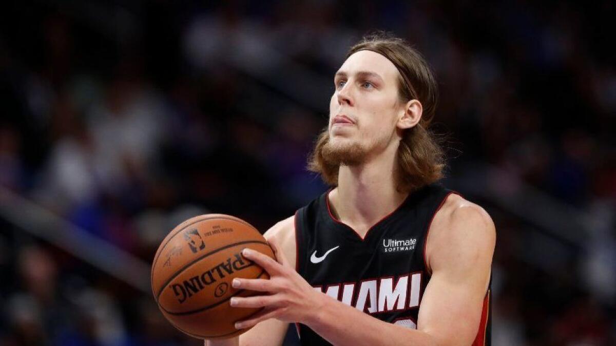 Miami Heat forward Kelly Olynyk shoots a free throw during the second half of an NBA basketball game against the Detroit Pistons, Monday, Nov. 5, 2018, in Detroit. (AP Photo/Carlos Osorio)