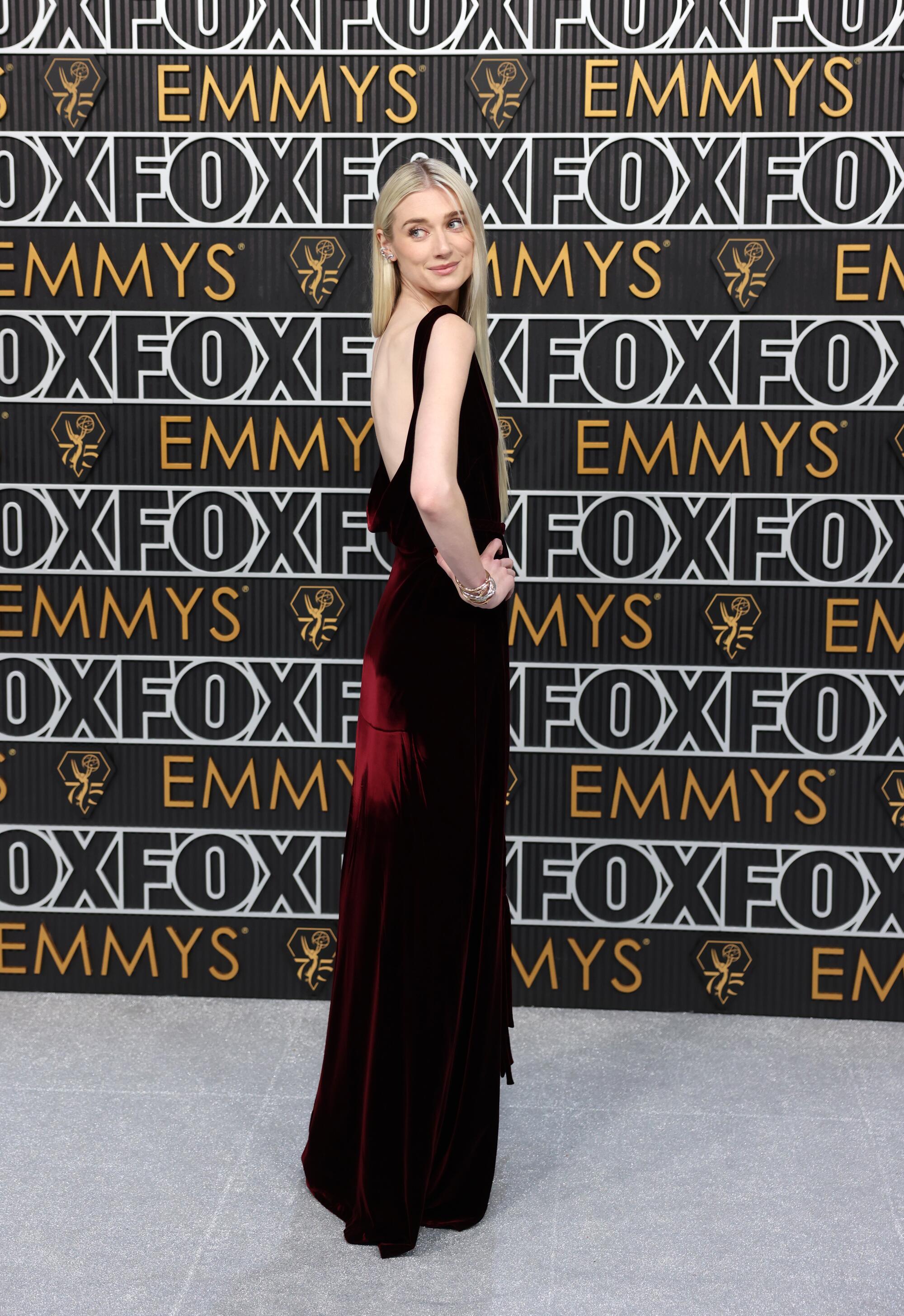 Elizabeth Debicki poses on the Emmys red carpet. 