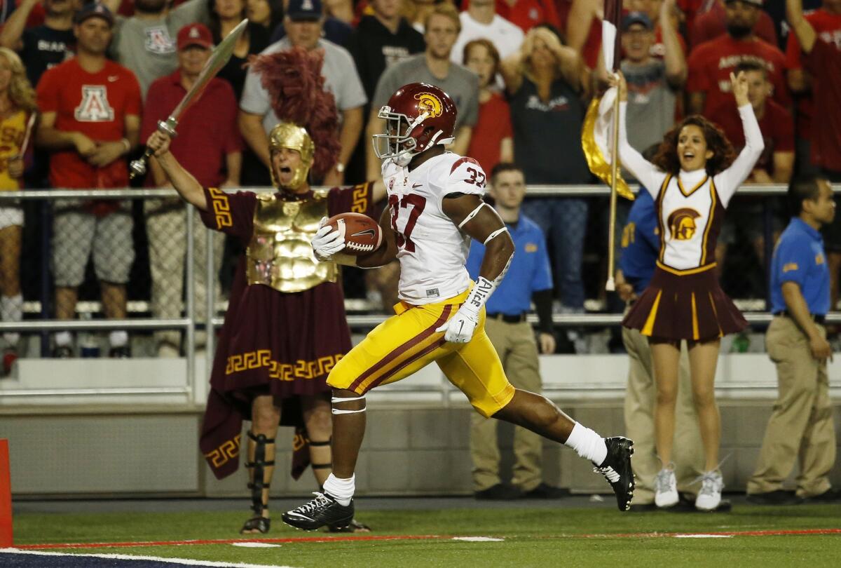 USC running back Javorius Allen scores on a 34-yard carry during the first quarter of Saturday's game against Arizona.