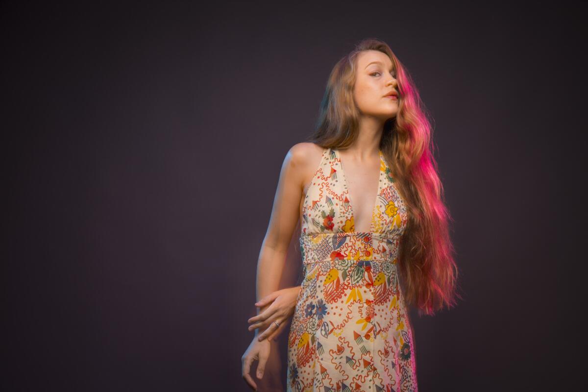 Harpist and singer-songwriter Joanna Newsom, photographed in the Los Angeles Times studio in downtown Los Angeles. Her recent statements about Spotify prompted an official reply from the company.