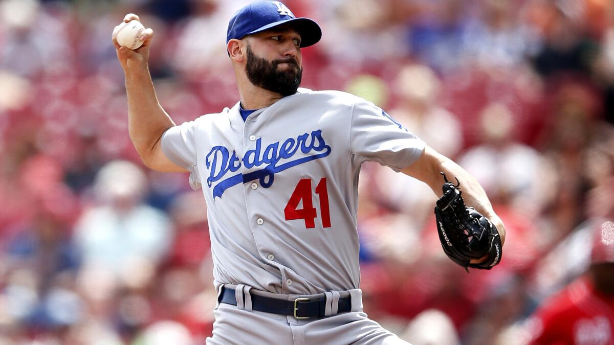 Dodgers reliever Chris Hatcher works in the eighth inning against the Reds during a game Aug. 27 in Cincinnati.