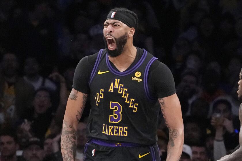 Los Angeles Lakers forward Anthony Davis celebrates after scoring during.
