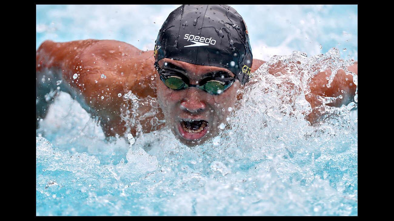 La CaÃ±ada High swimmer Danny Syrkin breaks the Division 2 meet record with a time of 47:48 in the varsity boys 100 yard butterfly event, at the 2018 CIF-SS Div. 2 Swimming and Diving Championships at Riverside City College Aquatics Center in Riverside on Saturday, May 12, 2018.