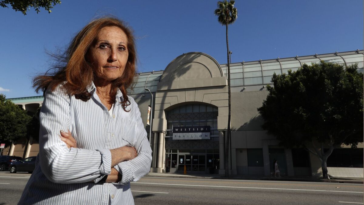 Terri Tippit stands on Pico Boulevard, across the street from the Westside Pavilion. The chairwoman for the Westside neighborhood council said she has shopped at the mall since its opening in 1985. The mall is set to close in 2021.