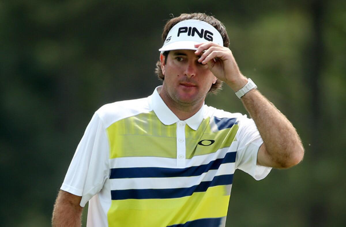 Bubba Watson acknowledges the crowd on the 18th green Friday during the second round of the Masters.