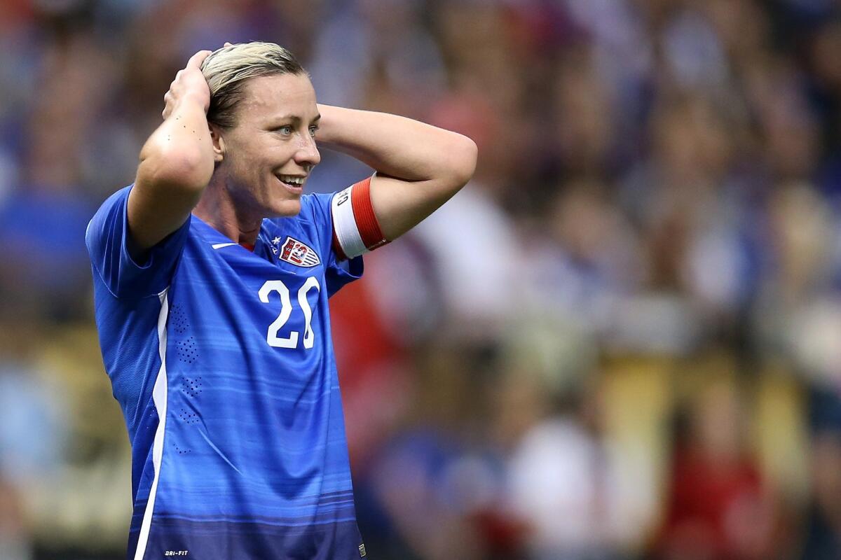 Abby Wambach (20) of the United States reacts during a match against China on Dec. 16.