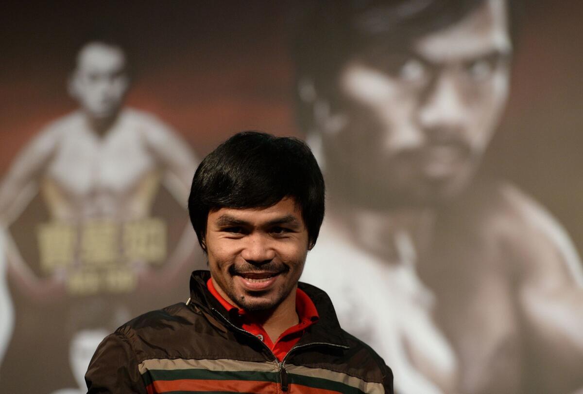 Manny Pacquiao has been spreading holiday cheer and pushing for a fight with Floyd Mayweather Jr. at the same time.
