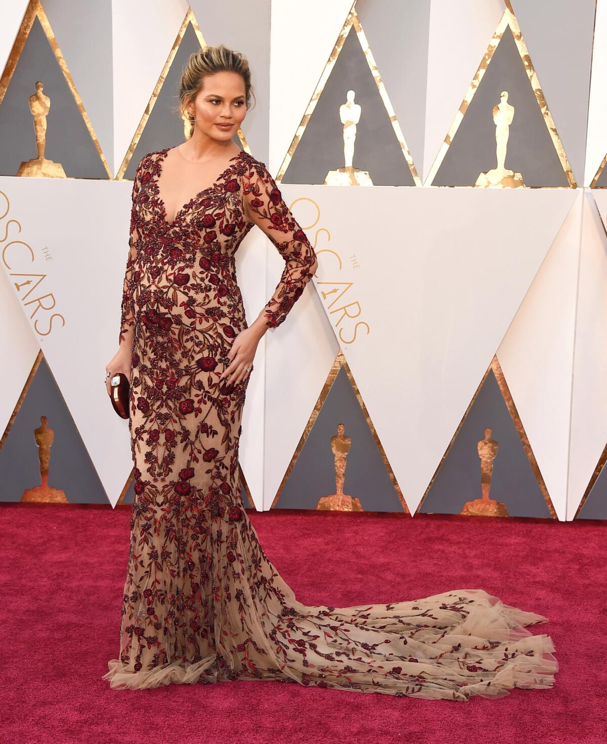 Chrissy Teigen on the 2016 Oscars red carpet.