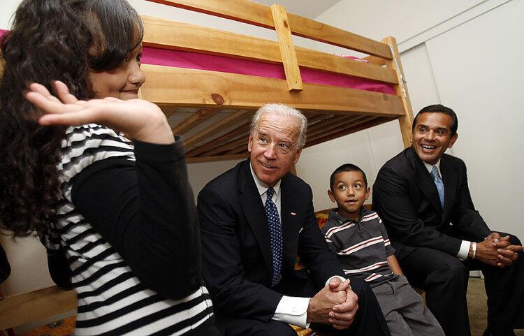 Romey Galindo, 8, and her brother Tyler, 6, show their room to Vice President Joe Biden and Los Angeles Mayor Antonio Villaraigosa during a visit Friday.