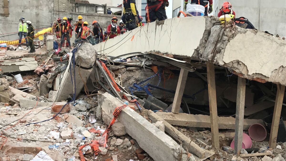 A Mexico City office building collapsed in the Sept. 19, 2017, earthquake, leaving entire floors stacked like pancakes.