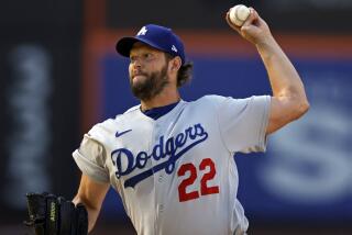 Los Angeles Dodgers pitcher Clayton Kershaw throws during the first inning.