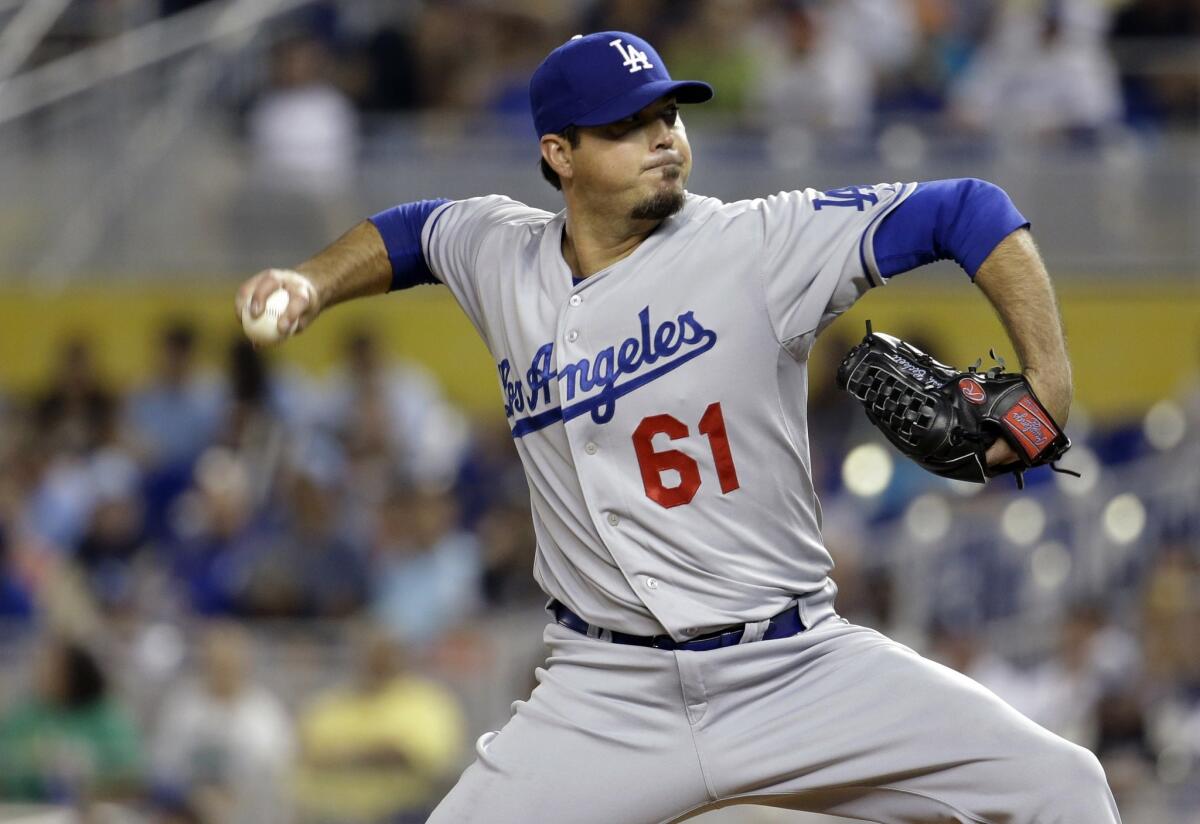 Josh Beckett gave up four earned runs and eight hits over 6 2/3 innings while walking one batter and striking out eight in a loss to the Marlins, 6-3.