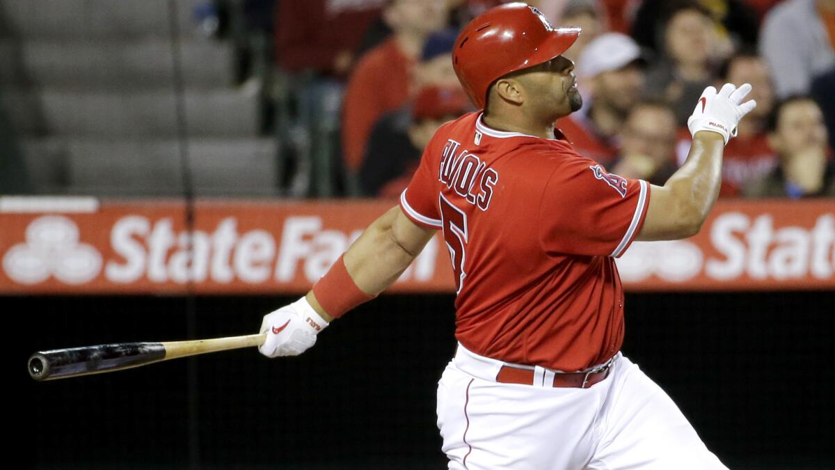 Albert Pujols is dealing with a strained left hamstring but the Angels believe the slugger can avoid going on the disabled list.