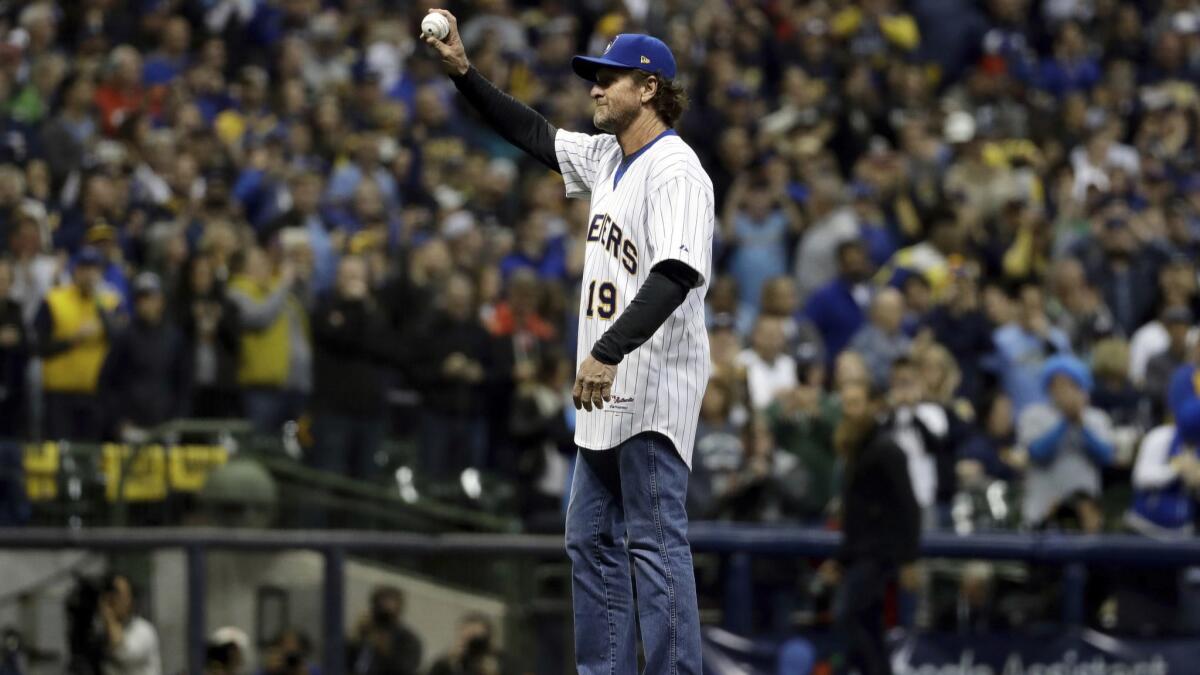 Robin Yount throws the ceremonial first pitch before Game 7 of the National League Championship Series between the Milwaukee Brewers and Dodgers.