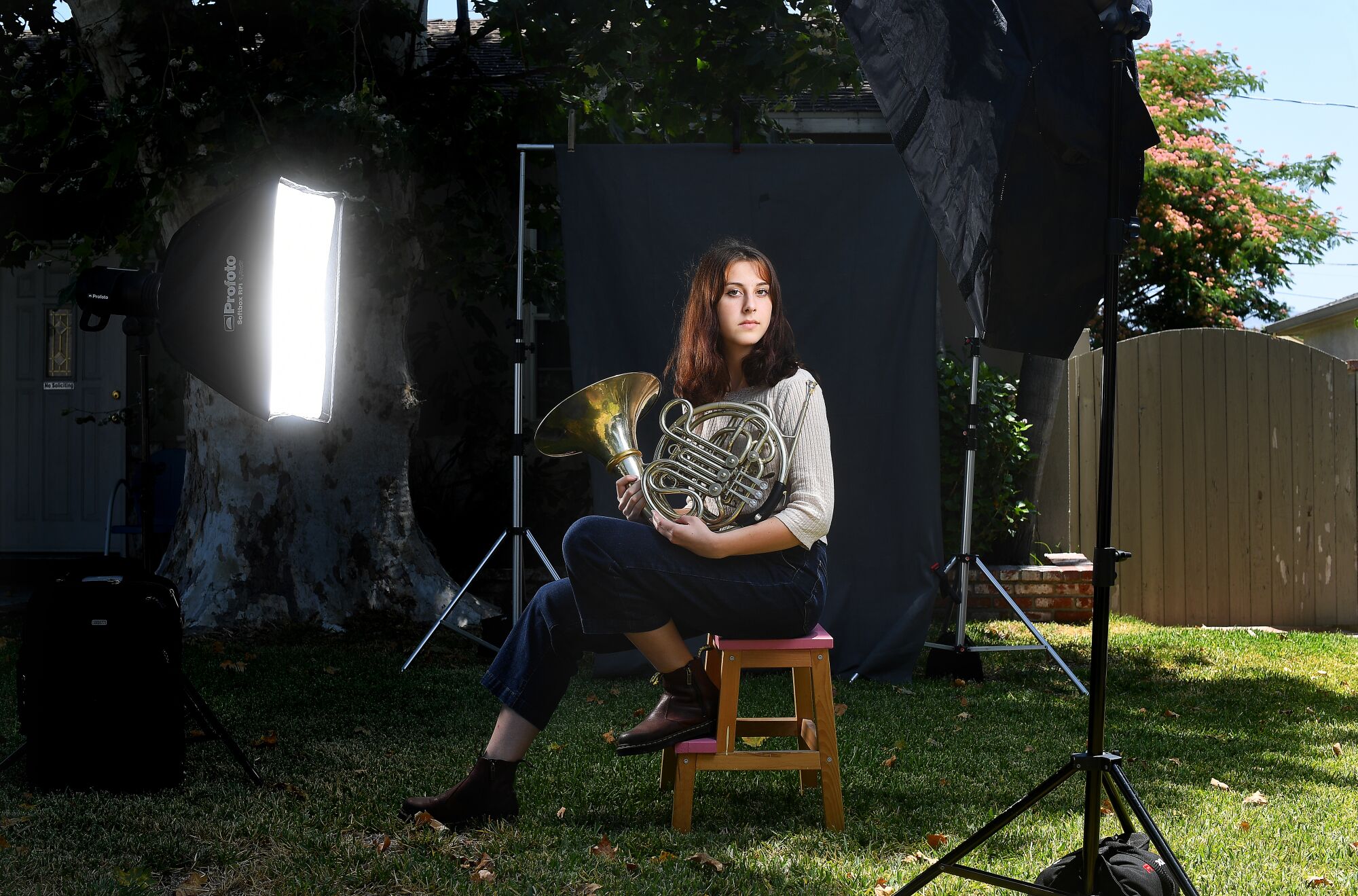 Dylan Kingdom at home with her French horn.