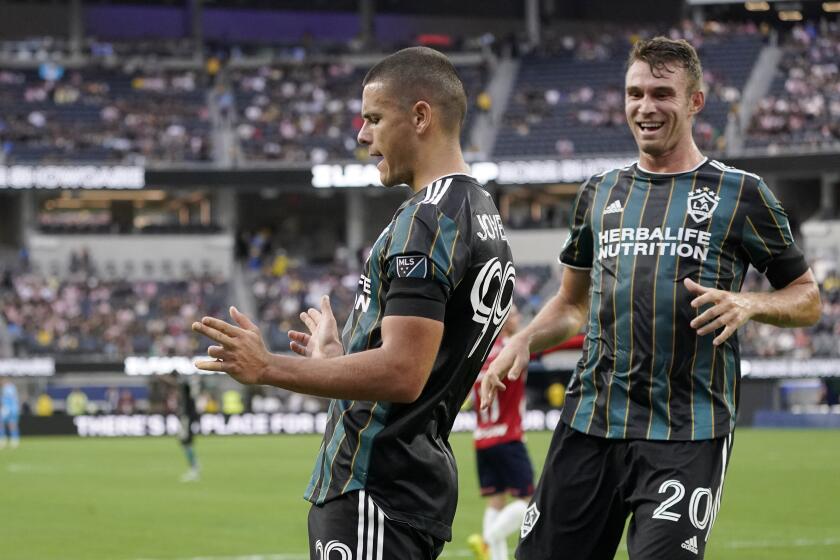 Los Angeles Galaxy forward Dejan Joveljic, left, celebrates his goal along with forward Nick DePuy during the first half of a Leagues Cup match against Chivas Wednesday, Aug. 3, 2022, in Inglewood, Calif. (AP Photo/Mark J. Terrill)