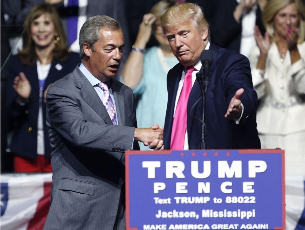 Donald Trump, right, welcomes pro-Brexit British politician Nigel Farage to speak at a campaign rally in Jackson, Miss., in August.