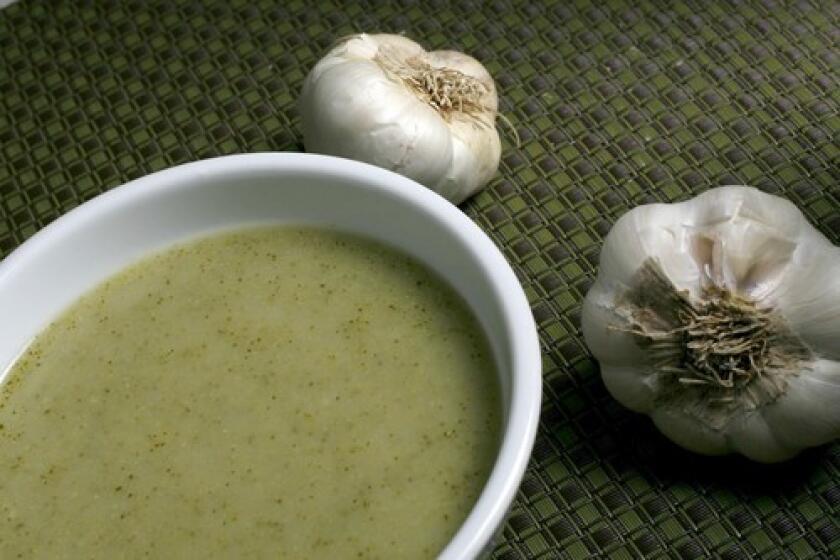 A bowl of broccoli and roasted garlic soup, a classic autumn offering.