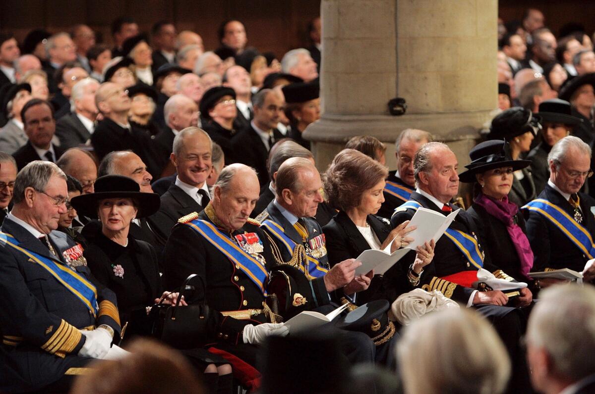 FILE - In this Saturday, Dec. 11, 2004, file photo, from left: Danish Prince Henrik, Queen Sonja and King Harald from Norway, Britain's Prince Philip, Queen Sofia, and King Juan Carlos from Spain and Queen Silvia and King Carl XVI Gustaf from Sweden during the funeral service of Dutch Prince Bernhard in the Nieuwe Kerk or New Church in Delft, The Netherlands. Prince Philip's life spanned just under an entire century of European history. His genealogy was just as broad, with Britain's longest-serving consort linked by blood and marriage to most of the continent's royal houses. (AP Photo/Jasper Juinen, File)