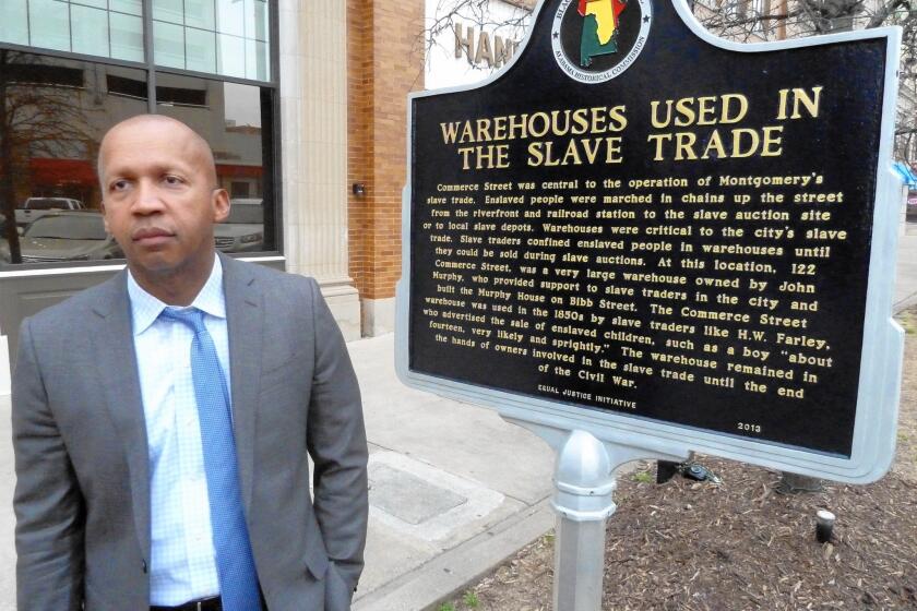 Bryan Stevenson, a civil rights lawyer, helped erect this marker in Montgomery, Ala., calling attention to the site's history in the slave trade.