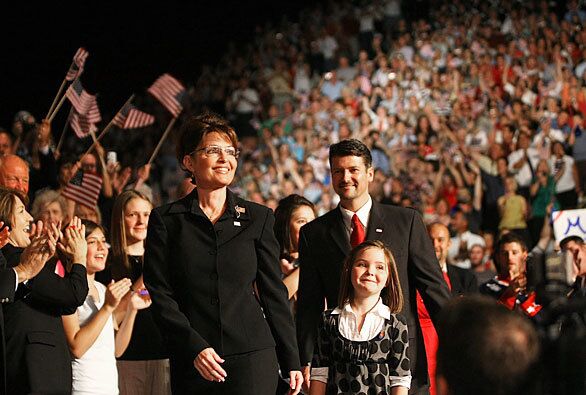 Alaska Gov. Sarah Palin, her husband Todd and daughter Piper arrive at a campaign rally for presumptive Republican presidential nominee john McCain today in Dayton, Ohio. McCain announced Gov. Palin as his vice presidential running mate at the rally.