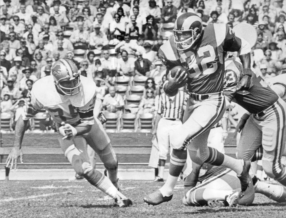Cullen Bryant, seen in 1974 in his No. 32 jersey, breaks away toward the sidelines for a big gain on a kickoff return. In 13 seasons in the National Football League, he scored a total of 23 rushing and receiving touchdowns. He ran for 3,264 yards in 849 carries, and caught 148 passes for 1,176 yards.