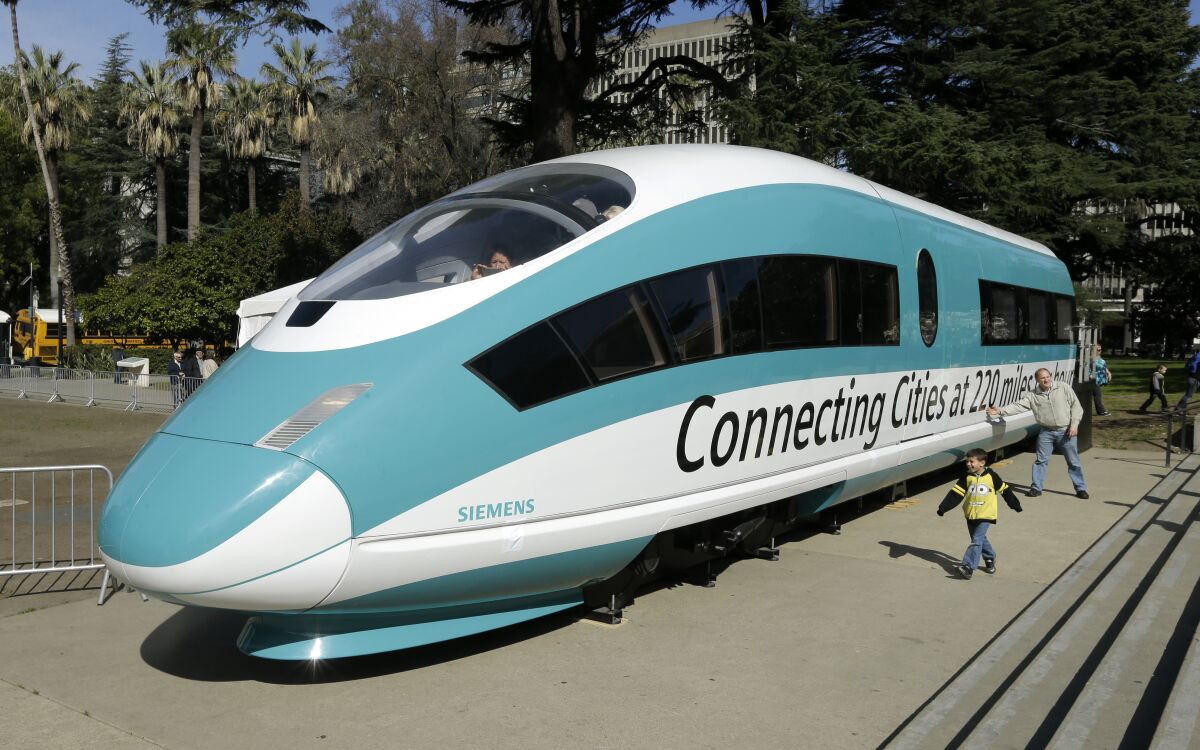  A full-scale mock-up of a high-speed train, is displayed at the Capitol in Sacramento, Calif., on Feb. 26, 2015.