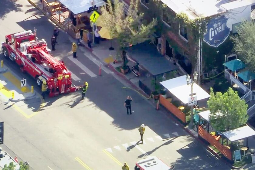 First responders at the scene, where a car slammed through the outdoor dining area of a Los Feliz restaurant