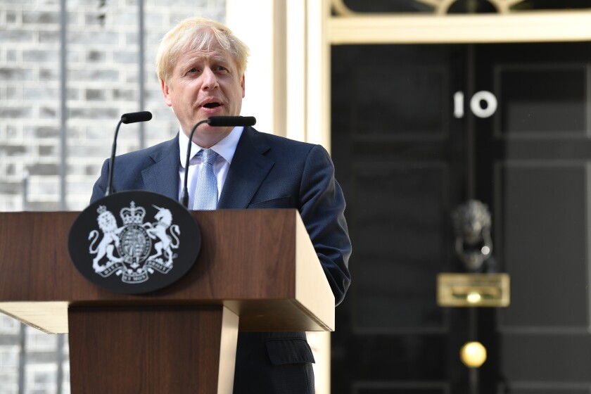 Boris Johnson arrives at 10 Downing St. to take office as British prime minister 