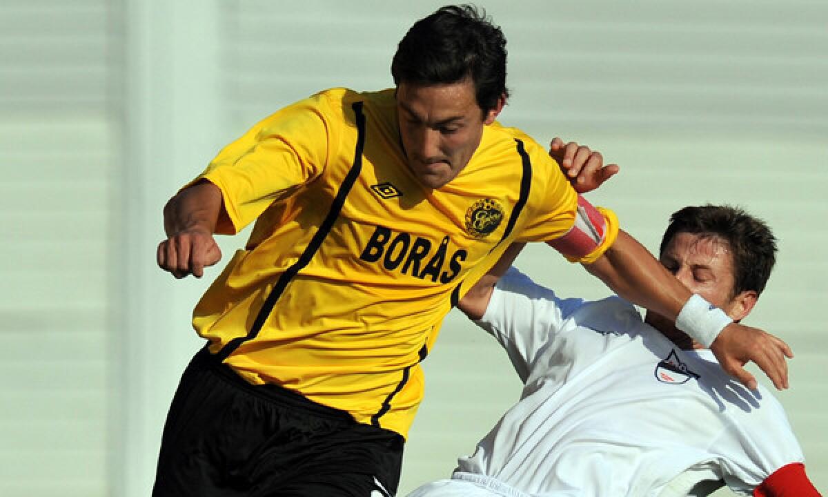 Midfielder Stefan Ishizaki, left, of Sweden's Elfsborg challenges Srgjan Zaharievski, right, of Macedonian team Teteks, during a UEFA Europa League match in 2010. Ishizaki, who signed with the Galaxy in the off-season, is still getting up to speed with playing soccer in the United States.