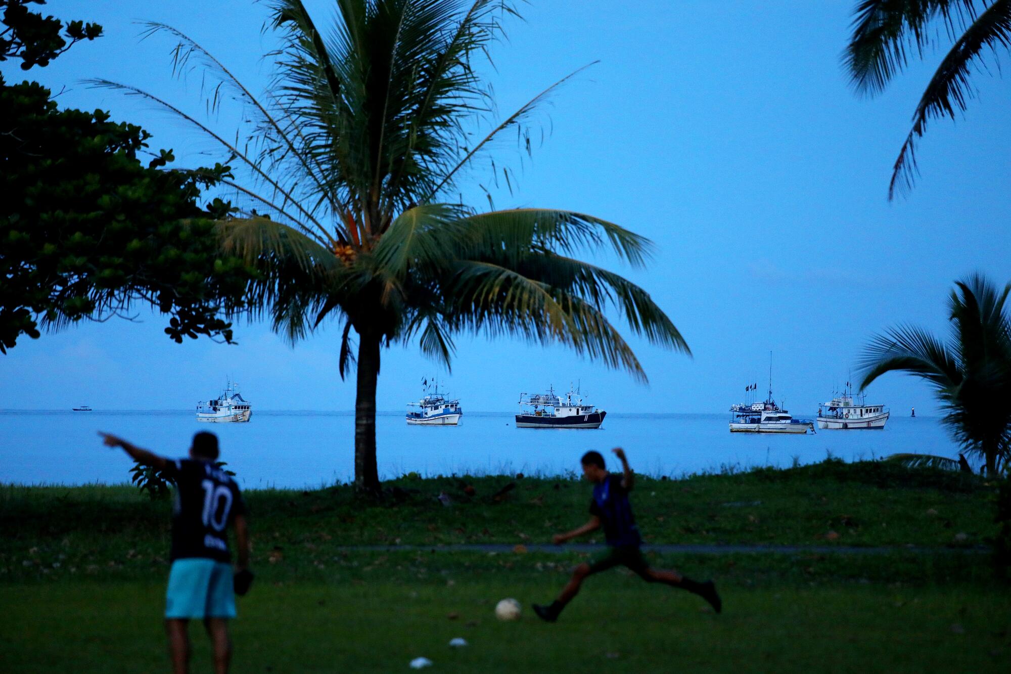 Soccer practice is held at a park alongside the beach near an entry point along the Rio Cieneguita