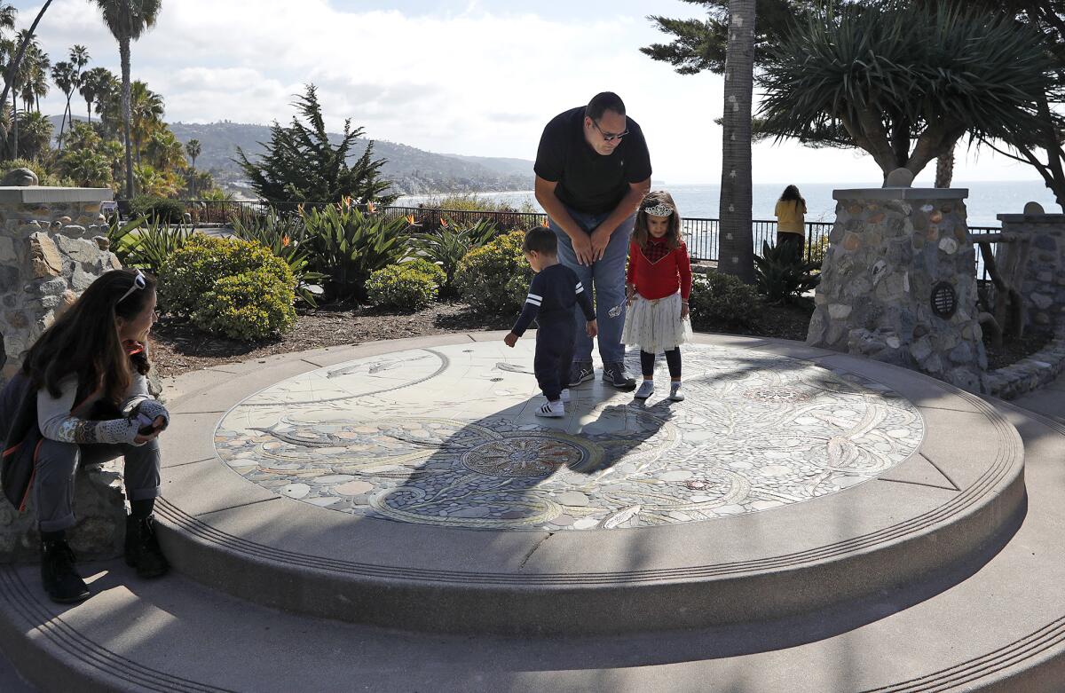 Visitors take in Scott and Naomi Schoenherr's "Lunar Tides.