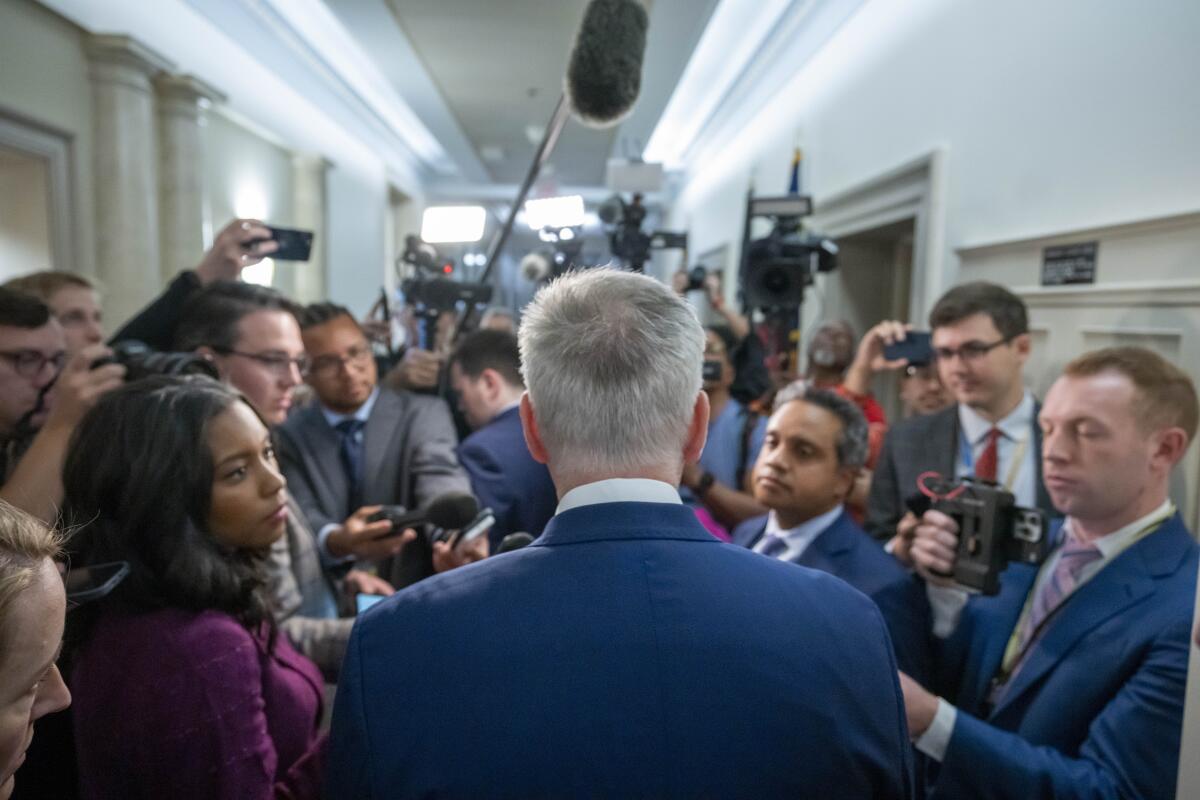 A man speaking to reporters on Capitol Hill 