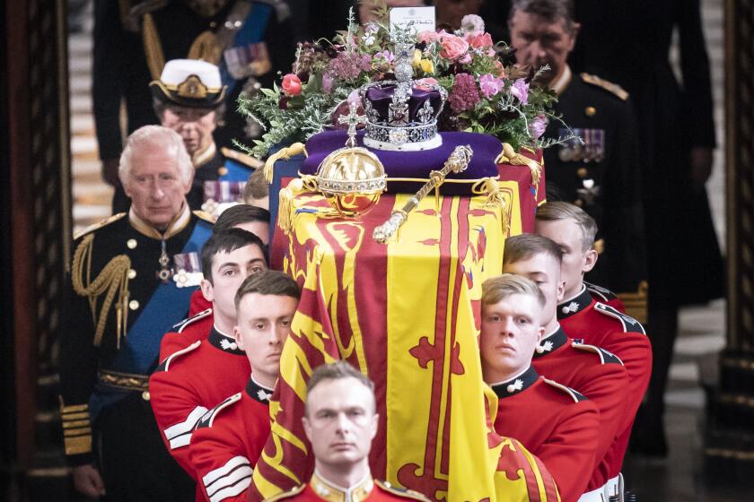 LONDON, ENGLAND - SEPTEMBER 19: King Charles III follows behind the coffin of Queen Elizabeth II, draped in the Royal Standard with the Imperial State Crown and the Sovereign's orb and sceptre, as it is carried out of Westminster Abbey. after the State Funeral of Queen Elizabeth II on September 19, 2022 in London, England. Elizabeth Alexandra Mary Windsor was born in Bruton Street, Mayfair, London on 21 April 1926. She married Prince Philip in 1947 and ascended the throne of the United Kingdom and Commonwealth on 6 February 1952 after the death of her Father, King George VI. Queen Elizabeth II died at Balmoral Castle in Scotland on September 8, 2022, and is succeeded by her eldest son, King Charles III. (Photo by Danny Lawson - WPA Pool/Getty Images)