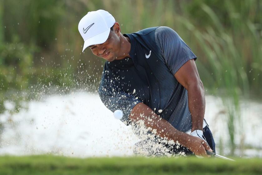 NASSAU, BAHAMAS - DECEMBER 02: Tiger Woods of the United States plays a shot from a bunker on the fifth hole during the third round of the Hero World Challenge at Albany, Bahamas on December 2, 2017 in Nassau, Bahamas. (Photo by Mike Ehrmann/Getty Images) ** OUTS - ELSENT, FPG, CM - OUTS * NM, PH, VA if sourced by CT, LA or MoD **