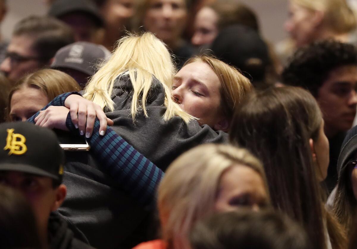 Santa Clarita residents gather at Grace Baptist Church after the shooting at nearby Saugus High School.