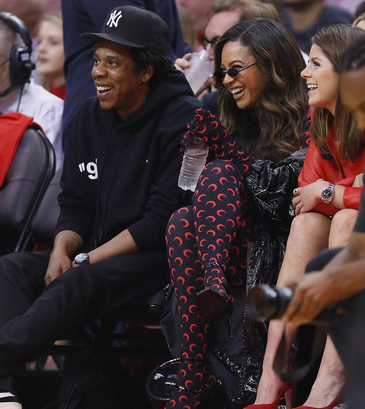 Jay-Z and Beyoncé watch from courtside during game six of the Western Conference semifinals of the 2019 NBA playoffs at Toyota Center in Houston on May 10.
