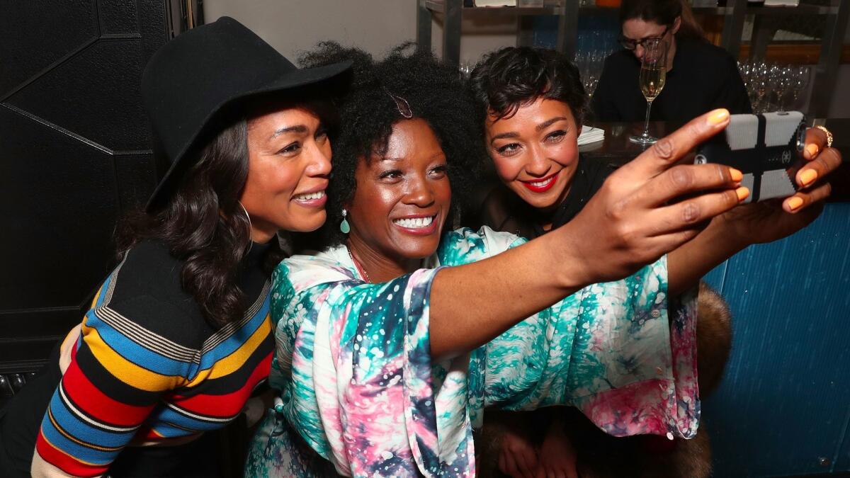 Angela Bassett, Yolanda Ross and Ruth Negga take a selfie.