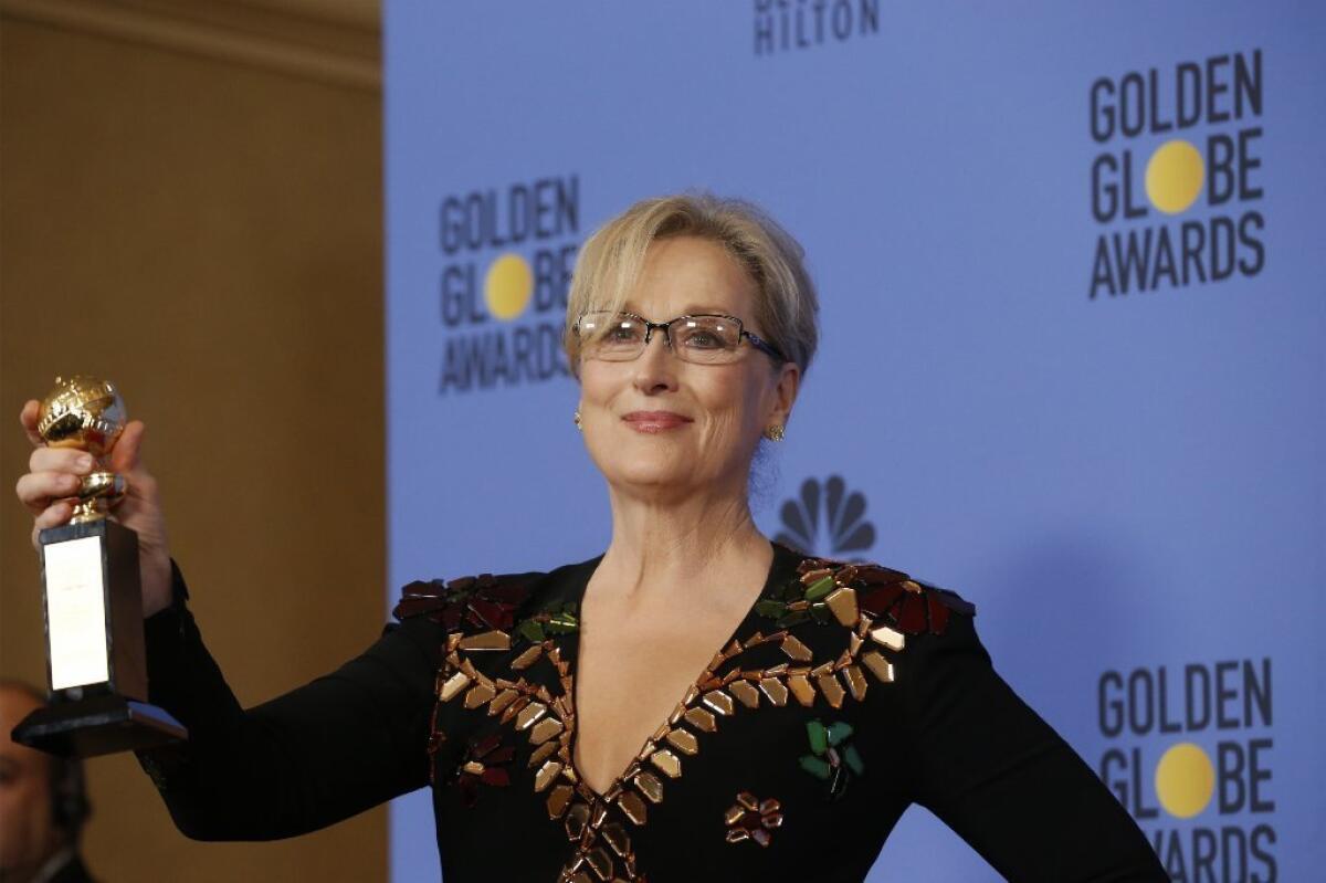 Meryl Streep with her Cecil B. DeMille Award at the Golden Globes.
