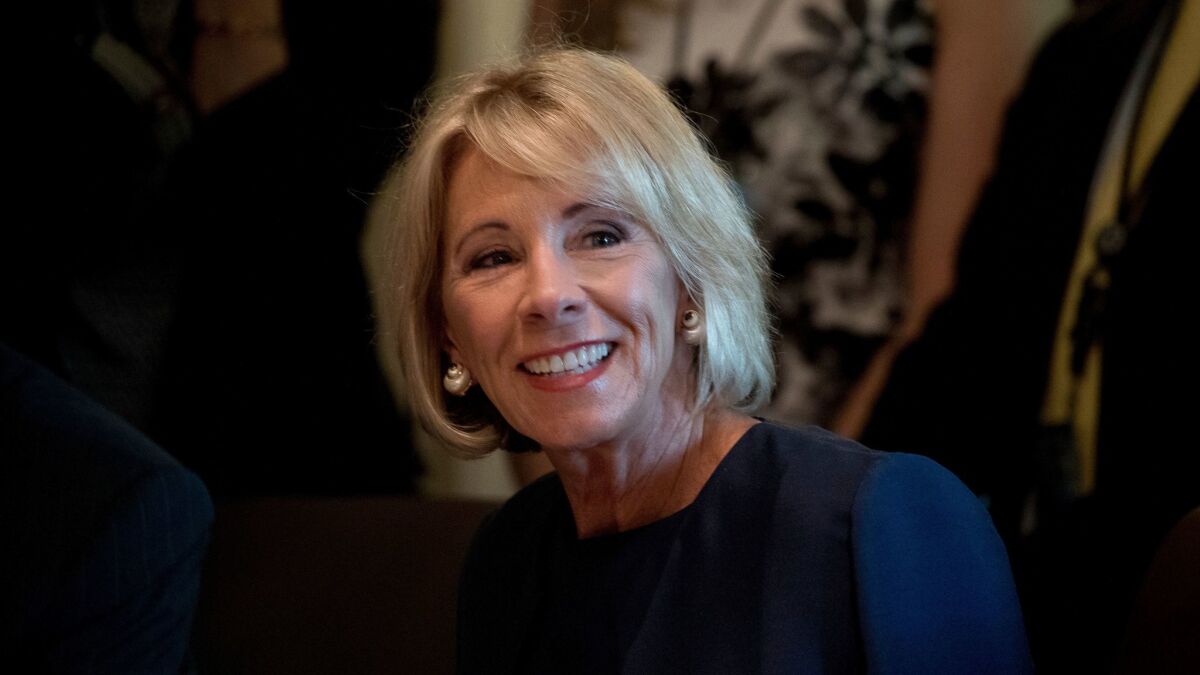 Education Secretary Betsy DeVos attends a meeting in the Cabinet Room of the White House in Washington on June 12.