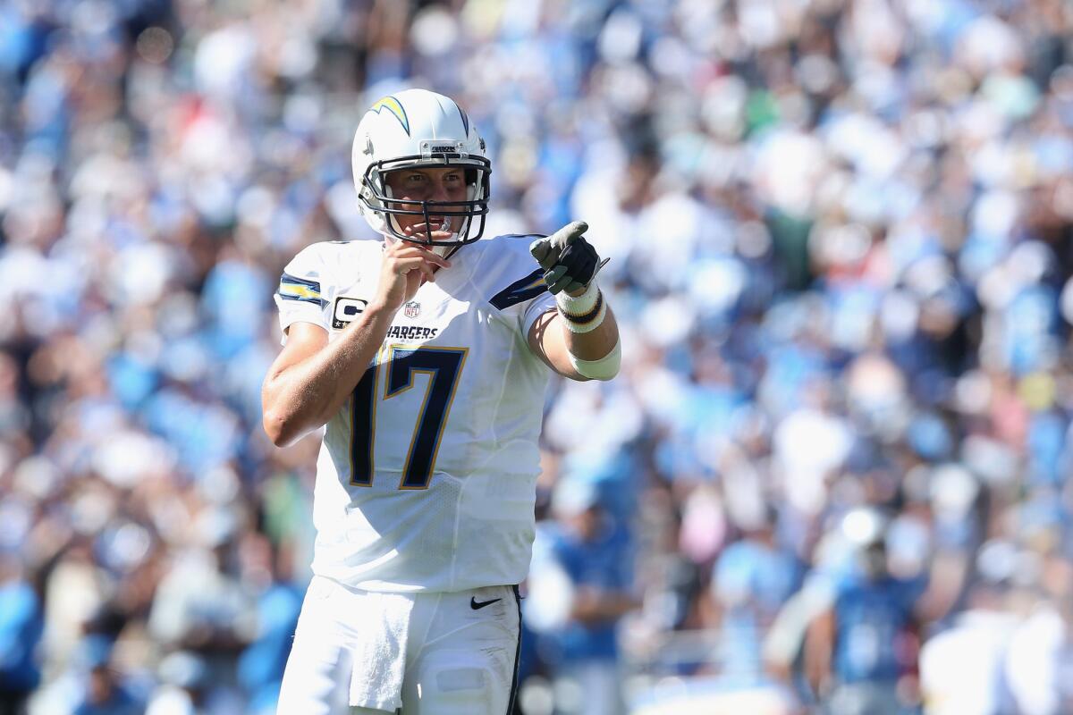 Chargers quarterback Philip Rivers signals toward the sideline during San Diego's 33-28 victory over the Detroit Lions in Week 1.