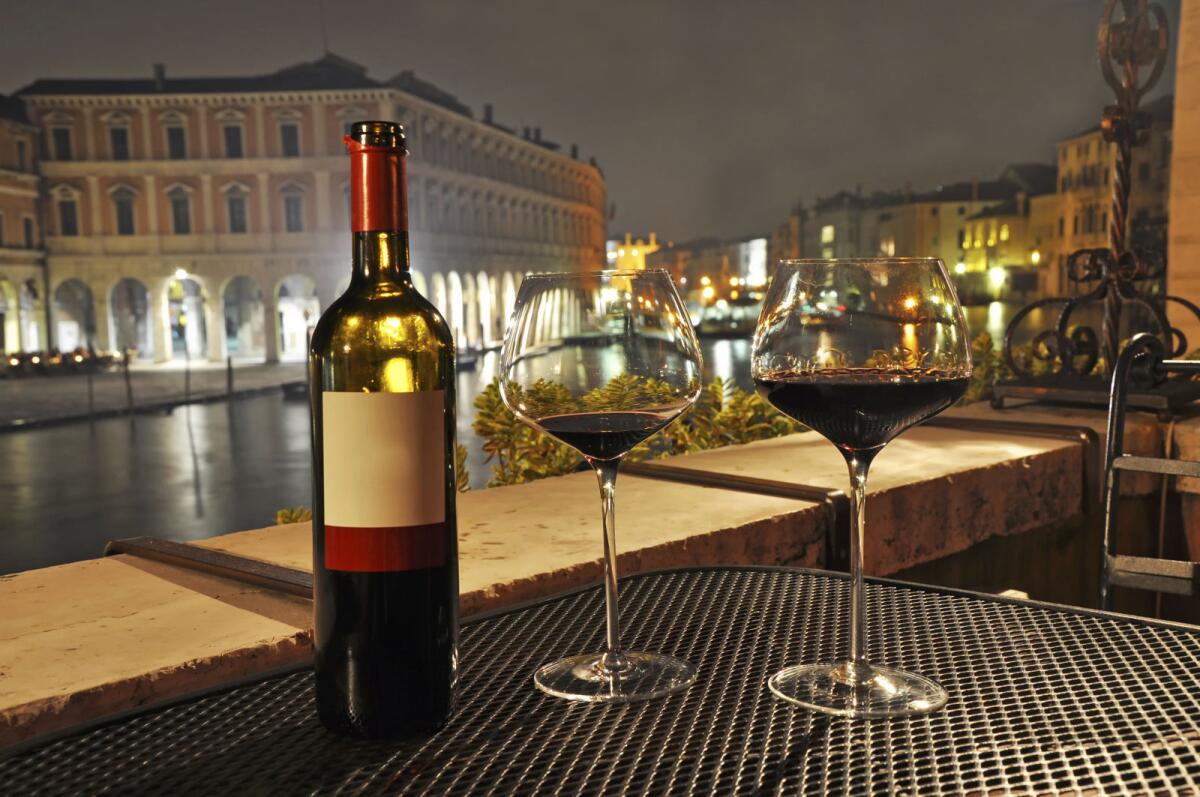 Wine for two awaits next to Venice's Grand Canal.