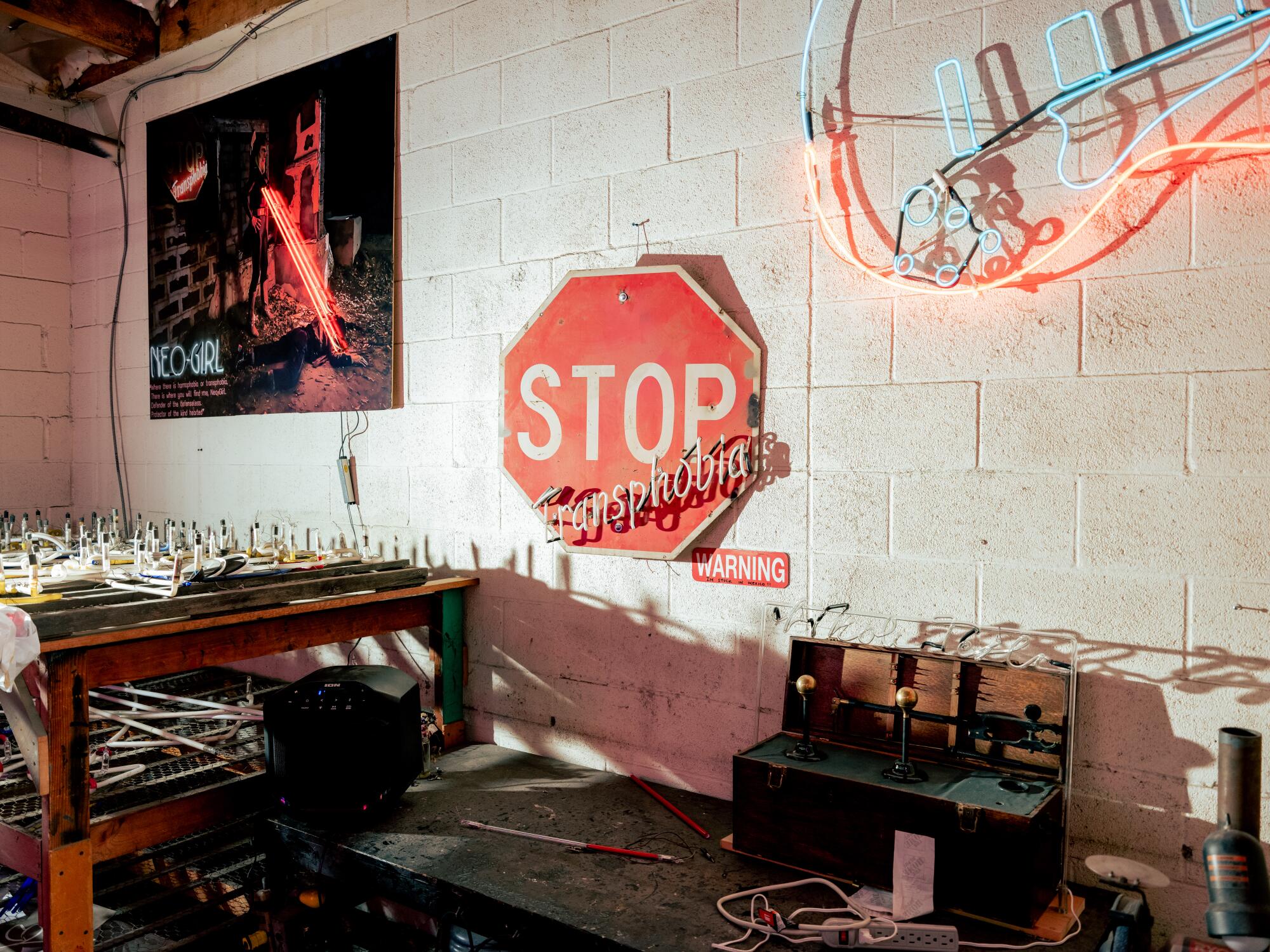 A neon art piece by Roxy Rose, reading