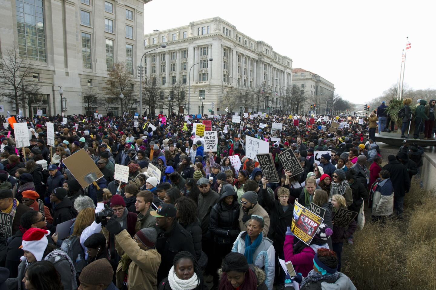 Thousands take part in the Justice for All March and Rally on Pennsylvania Avenue to the US Capitol in Washington, DC, on December 13, 2014, to protest the killings of unarmed African-Americans by police officers and the decisions by Grand Juries to not indict them.