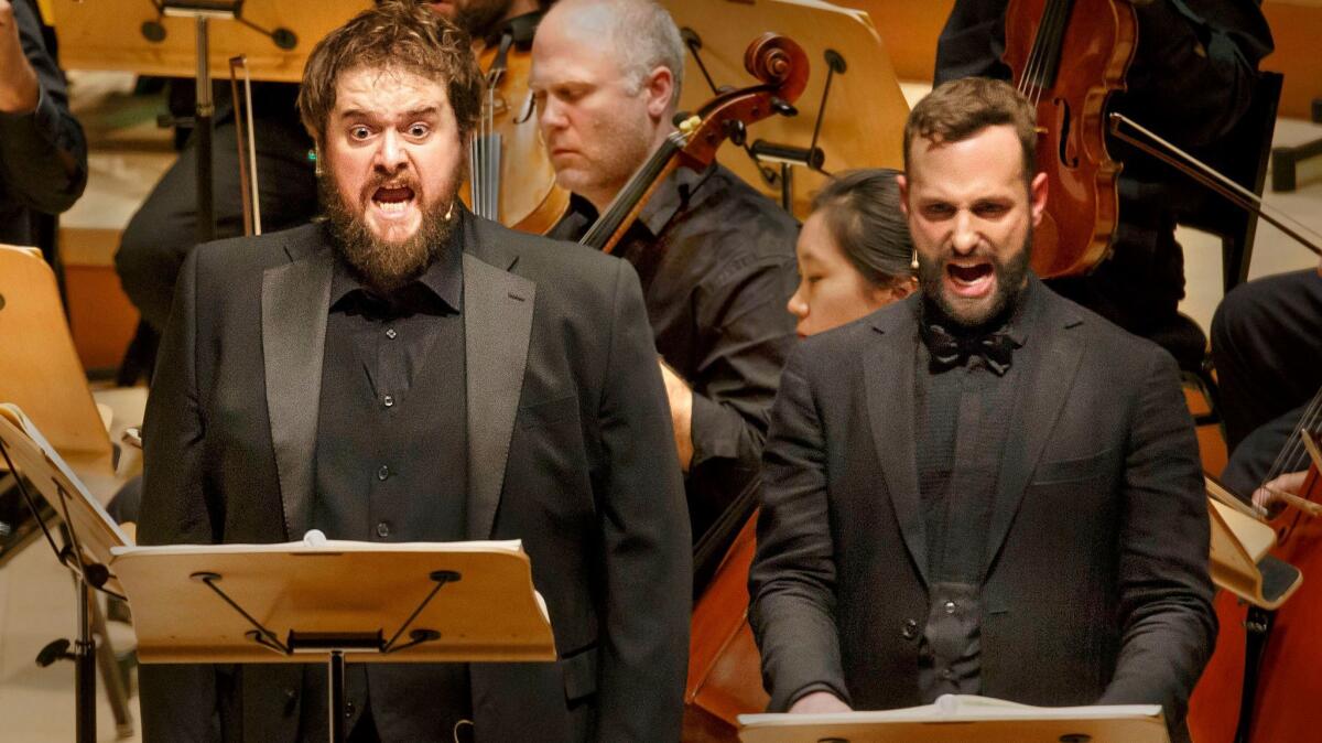 Allan Clayton, left, and Peter Tantsits perform the world premiere of "Alice's Adventures Under Ground" at Walt Disney Concert Hall.