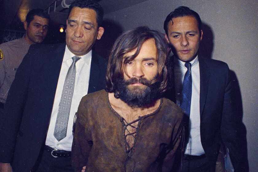 Charles Manson escorted into court in 1969.